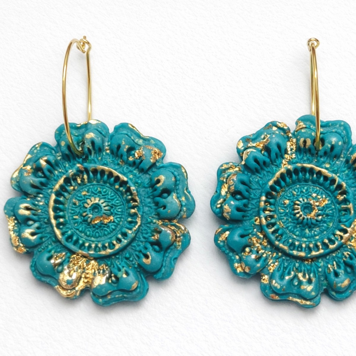 Turqoise mandala with gold accents