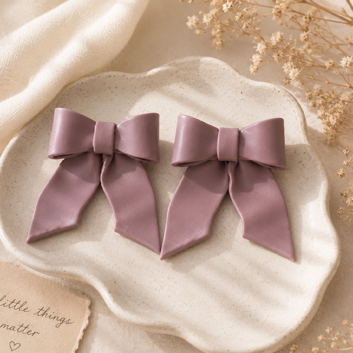 Elegant Mauve Bow Stud Earrings
