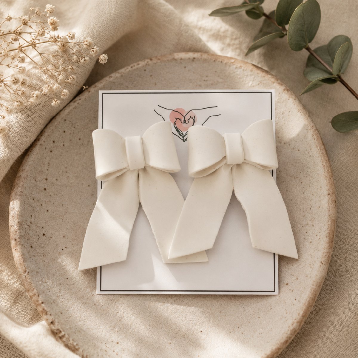 Ivory Bow Studs